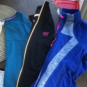 3 long sleeve tops. 2 Ivivvia & 1 Abercrombie Athletic Wear